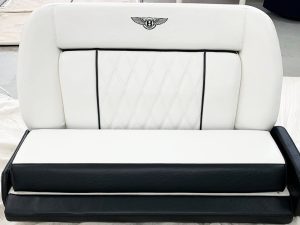 Reupholstered Boat Couch with Custom Insignia
